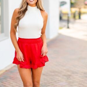 The Kermist • K Kemi cherry red ruffled high waisted shorts